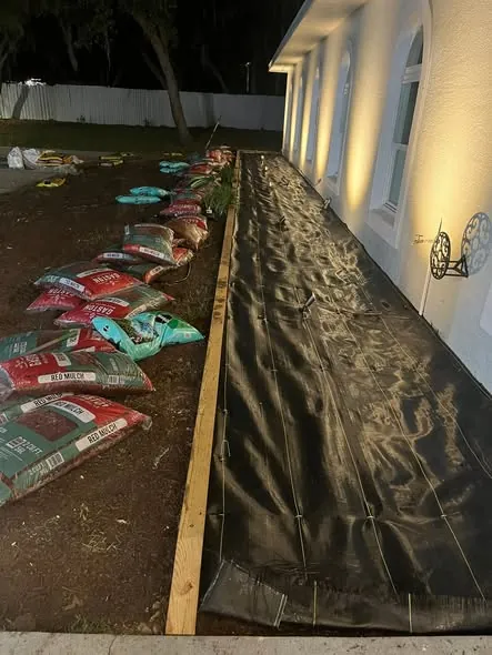 Commercial bed prep with fabric and mulch
