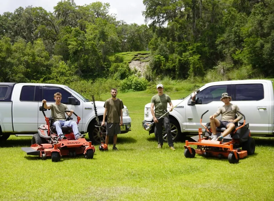 The Ton's Agricultural Services crew with mowers and trucks